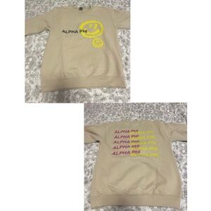 Tan Alpha Phi crewneck w/ “ALPHA PHI” & yellow smiley faces